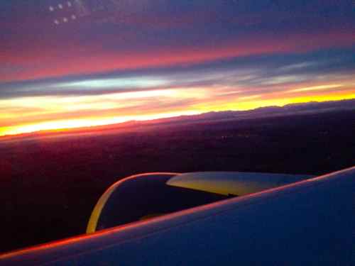 pink sunrise from an airplane