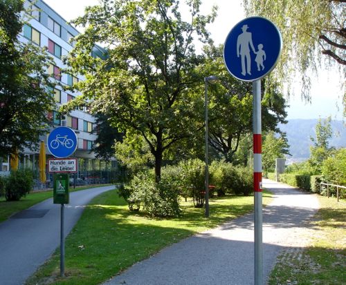 Signs designating the bicycle and pedestrians paths